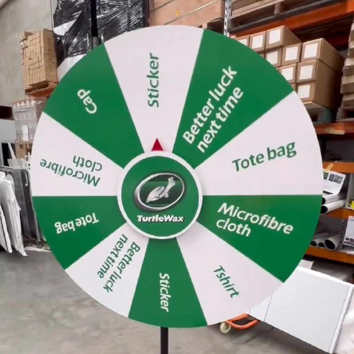 Spinning prize wheel with colorful sections.