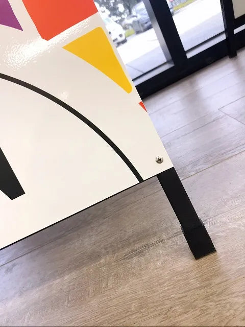 Black steel A-frame sidewalk sign for displaying posters.