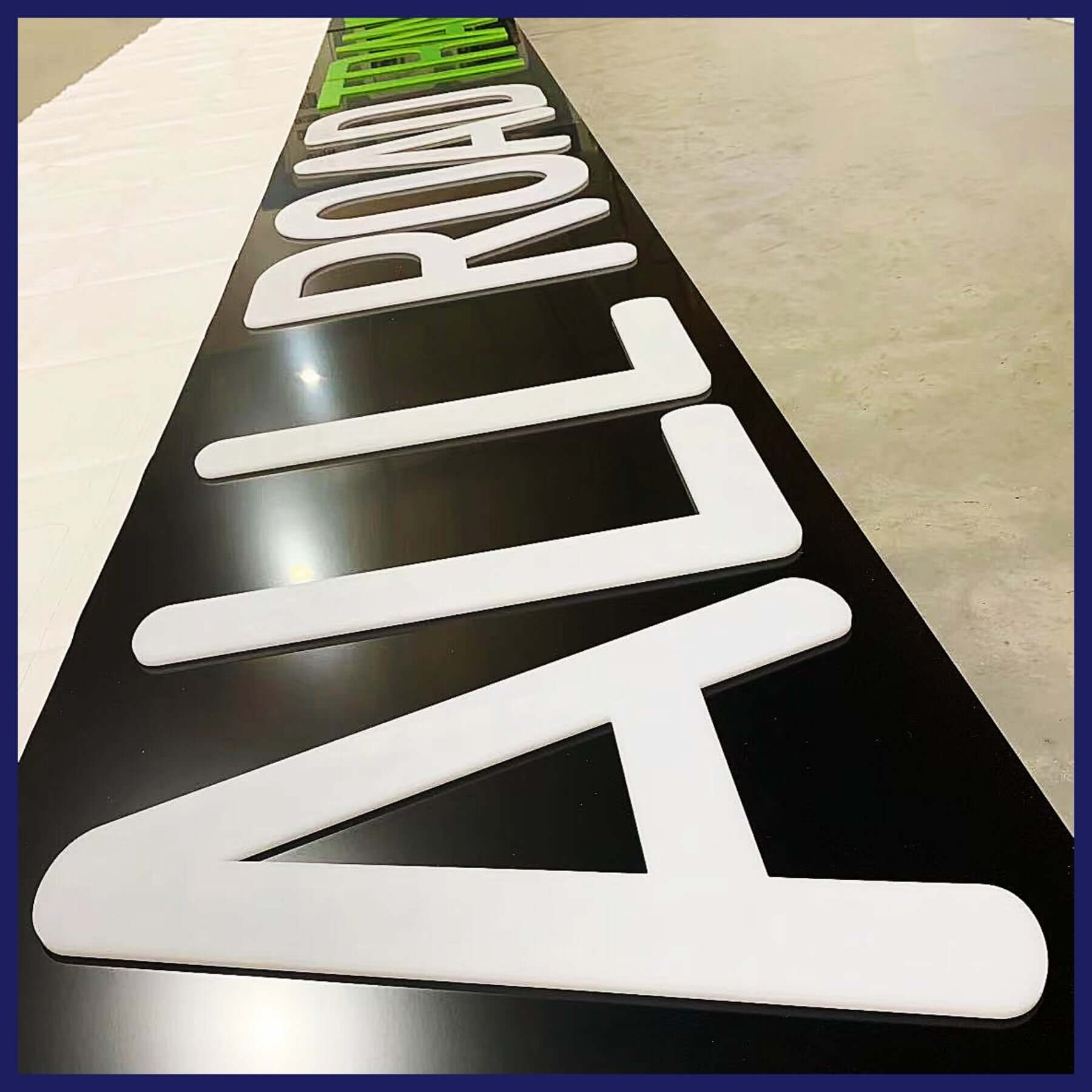 Raised acrylic letters.