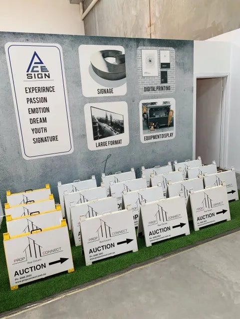 Standard white plastic A-frame sign.