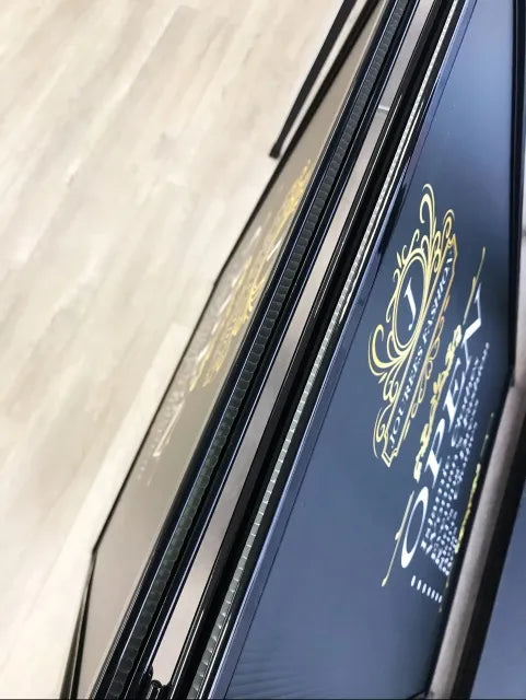 Black steel A-frame sign holder with replaceable corflute insert.