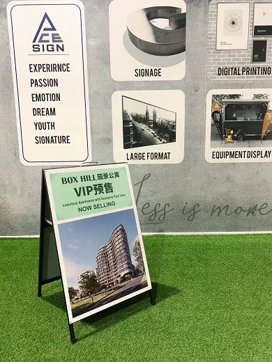 Black steel A-frame sign holder.