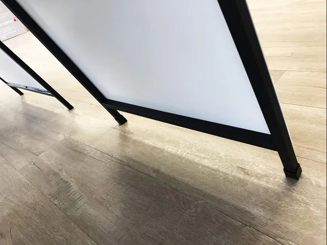 Black steel A-frame sign holder.