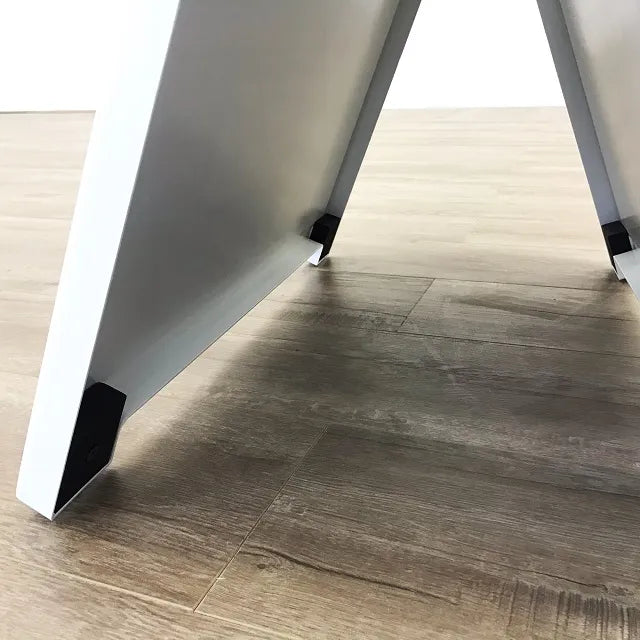 Yellow plastic A-frame sign for real estate.