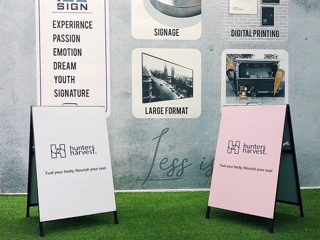 Black steel A-frame sign holder.